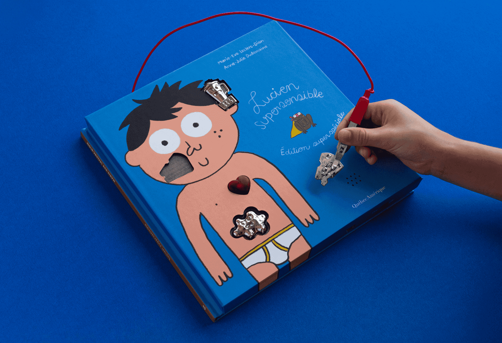 Interactive educational book about Lucien Supersensible with engaging illustrations.